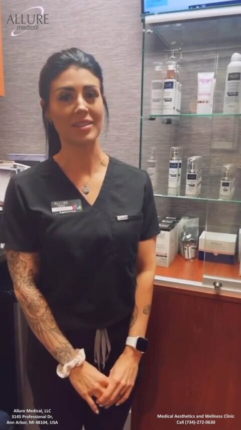 A woman in black scrubs stands in a medical clinic with skincare products displayed in the background. The text "Allure Medical" and contact information are visible in the corners of the image.